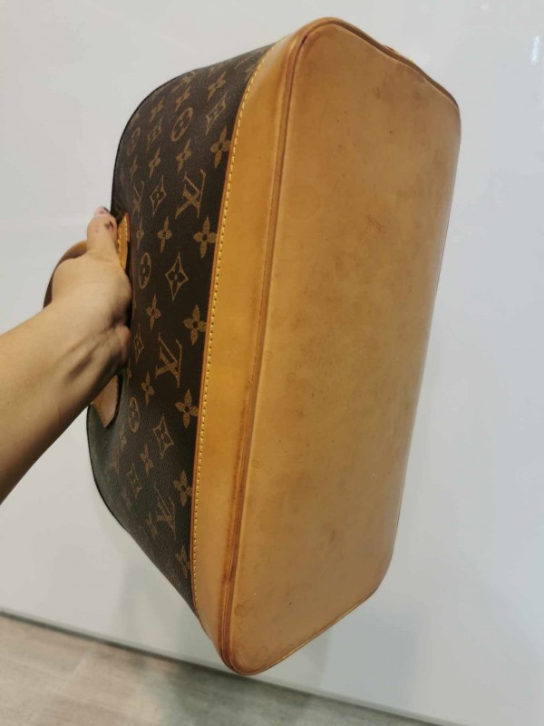 Pigmentation du cuir d'un sac Louis Vuitton Alma