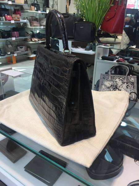 Restauration complète d'un sac Hermès modèle Kelly en crocodile à Cannes